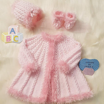 Holly swing coat with fur trim baby knitting pattern