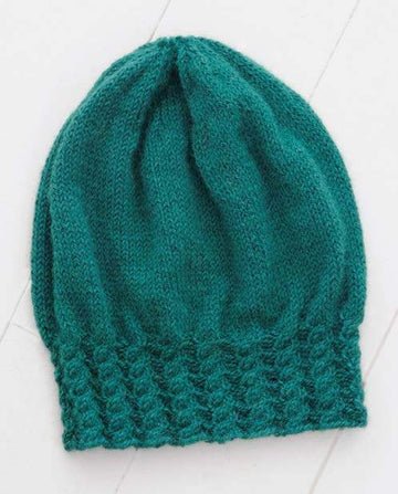 Cabled Slouch Hat in Blue Sky Fibers - T7 PDF