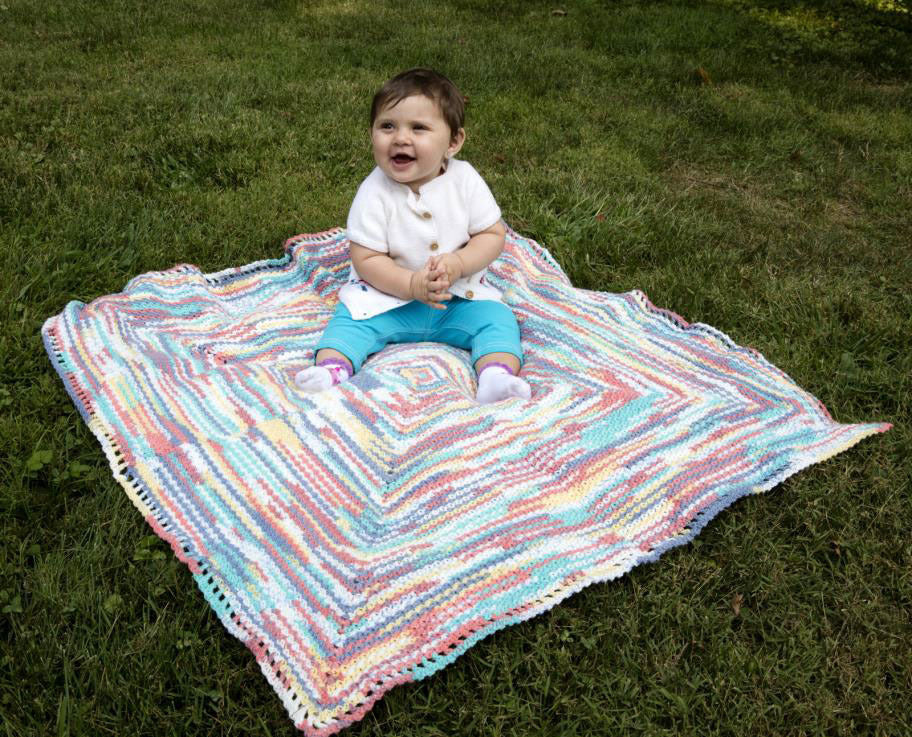 Mark The Spot Baby Blanket in Plymouth Yarn Dreambaby DK Paintpot