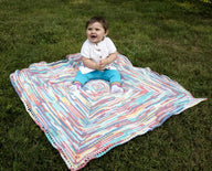 Mark The Spot Baby Blanket in Plymouth Yarn Dreambaby DK Paintpot