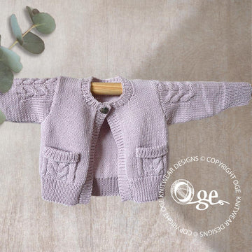 Child’s Cardigan with cable detail on sleeves and pockets - P065
