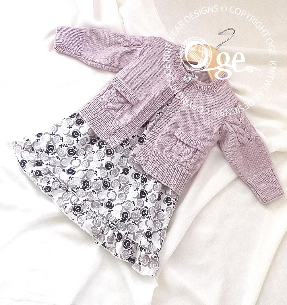 Child’s Cardigan with cable detail on sleeves and pockets - P065