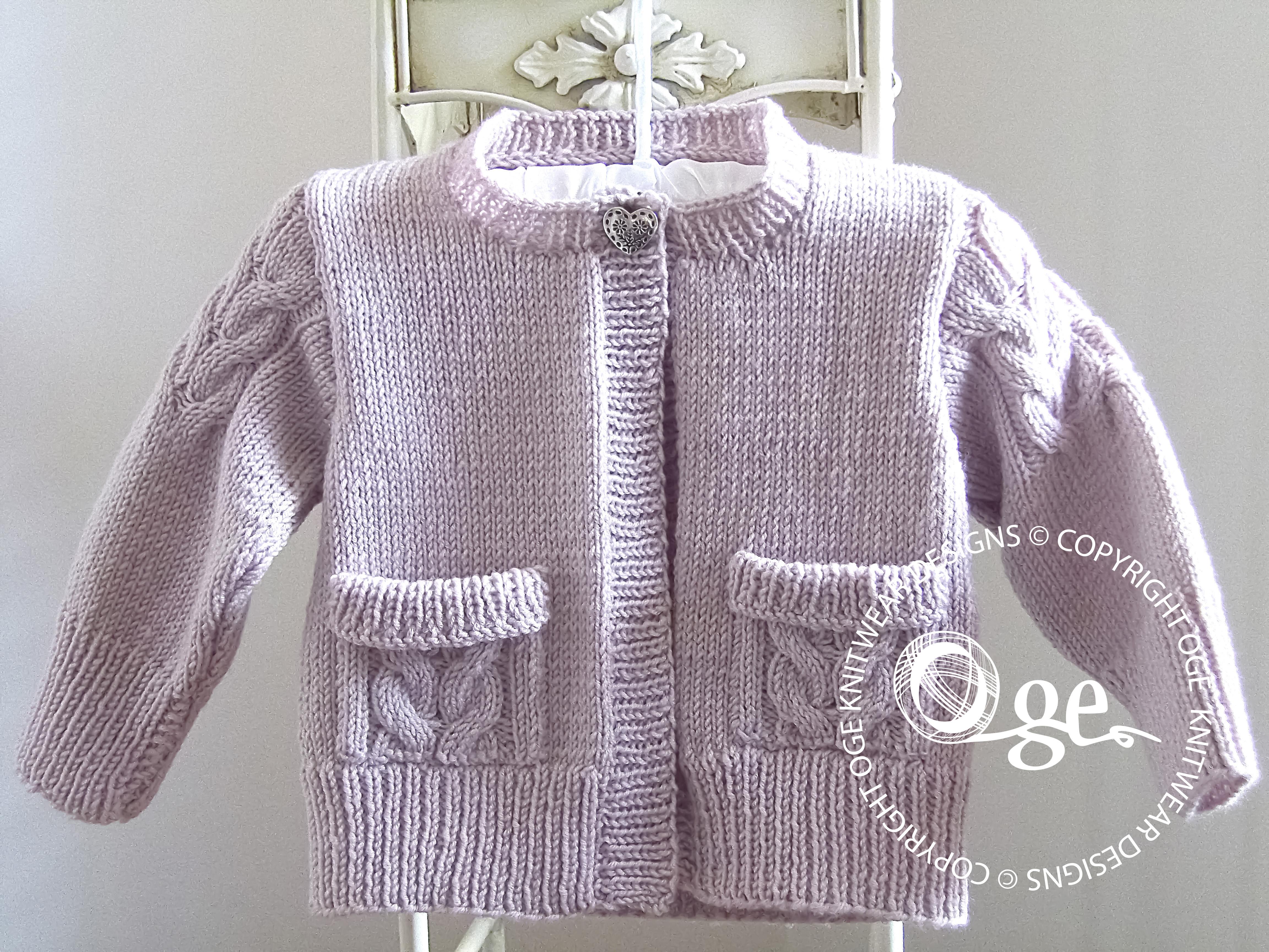 Child’s Cardigan with cable detail on sleeves and pockets - P065